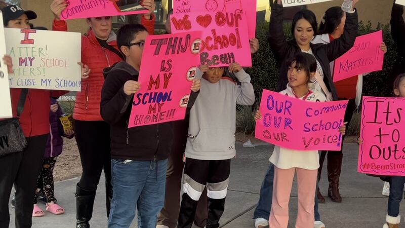 Parents and students from Bean Elementary shouted chants in support of their school before...