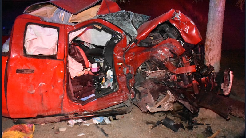Red pickup M.T. was driving and E.T was riding in at the scene of the crash.