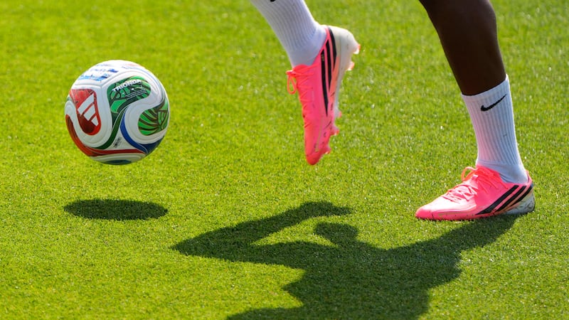 A Netherlands national team player practices for the World Cup soccer tournament, Wednesday,...