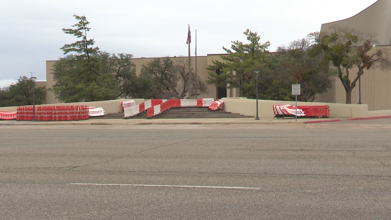 Barricades outside the Civic Center show the only entrance is on the west side of the...