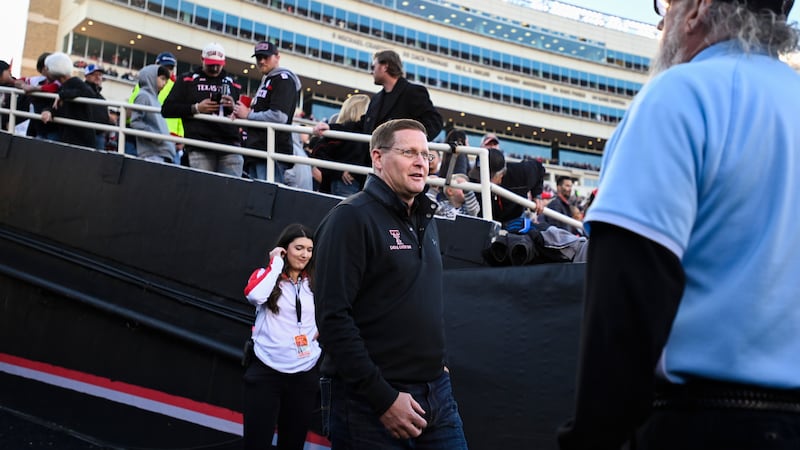 Texas Tech athletic director Kirby Hocutt walks down the tunnel before an NCAA college...